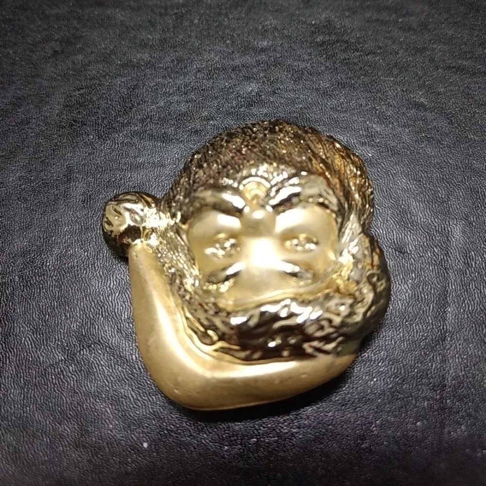 Gold tone vintage Santa Claus brooch